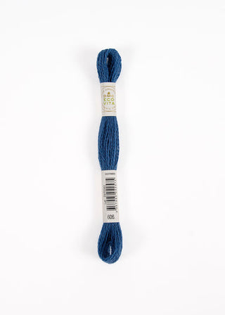 A single skein of wool DMC embroidery floss in a deep blue color, wrapped with two white paper labels showing the brand 'Eco Vita' and product details, set against a plain white background.
